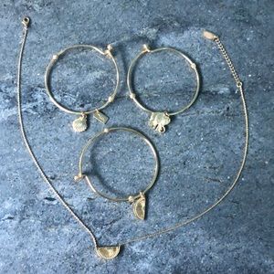 Goldtone Lilly orange slice necklace with bangle bracelets